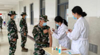 US military requires flu vaccine for some after outbreak in Texas training center